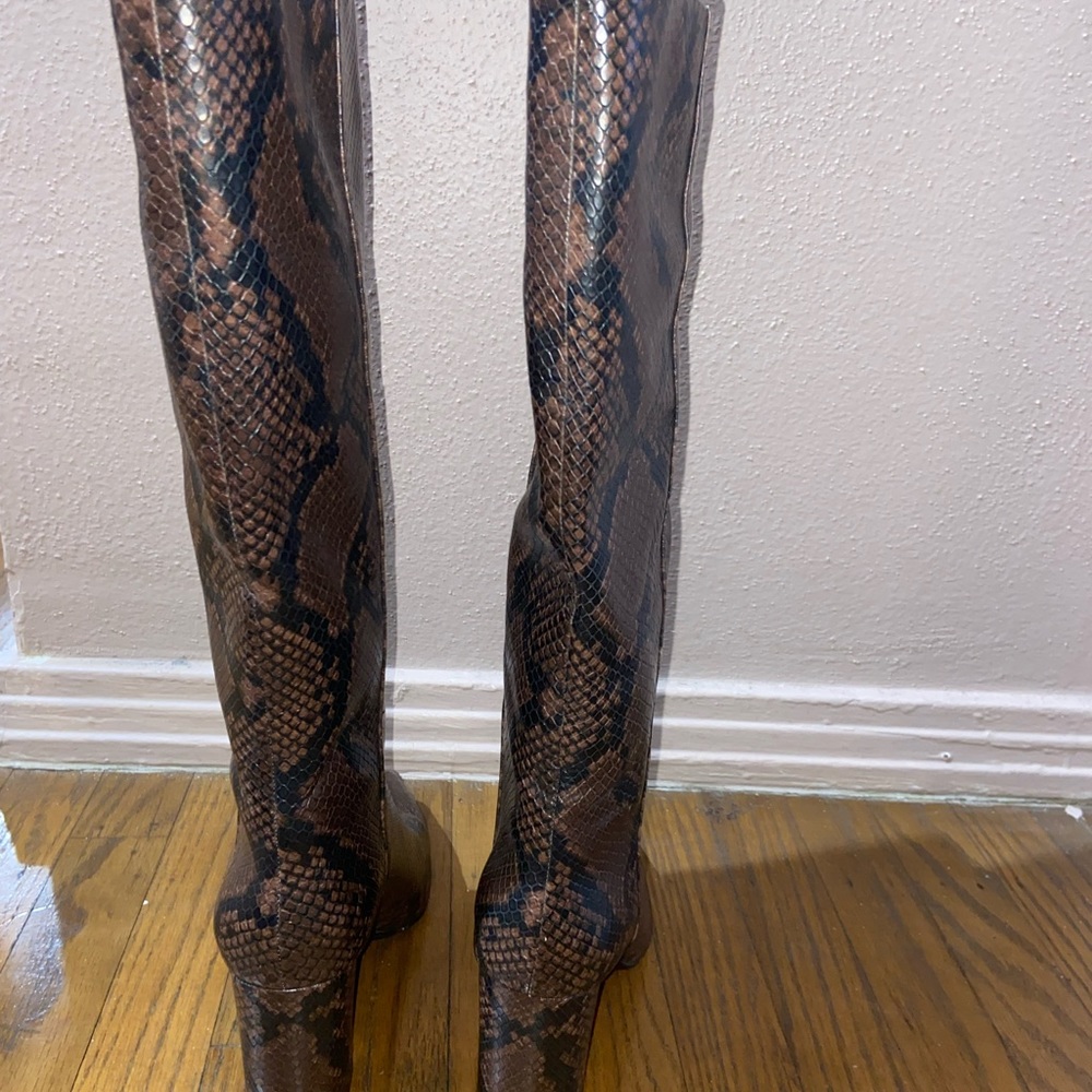 Tall animal print heeled boots